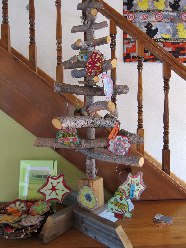 Our holiday tree (made from a tree by Barbara Gilhooly) and hung with my Hanna-Dyed holiday ornaments.